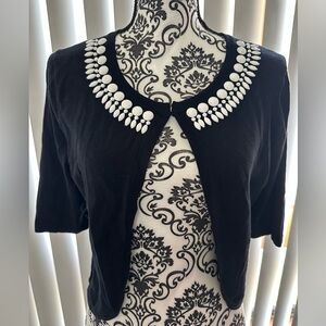 Elegant Black Sweater with White Beaded Collar